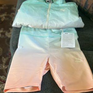 Brand new puma jacket/and shorts